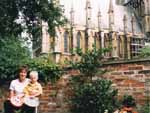 Di and Felix in their back garden, Lincoln Cathedral in background