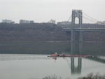 A barge being pushed upriver on a gray day, 3/03/2001