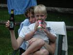 Di and Felix enjoying refreshments by the pool at Grandpa's house. 6/2001