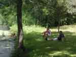 Felix, Robyn and Eric by the pond in Mom & Dad's back yard, 7/12/02