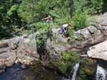 Robyn and Felix, high up on the waterfall overlooking a small pool