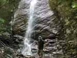 Froehler at the base of the waterfall that gives "Cascade Lake" its name