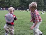 Felix playing frisbee with Christopher Kiely in Cetral Park, 10/6/02