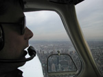 Mark at the controls as we cruise past midtown