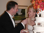 Bob & Whitney doing the cake thing at the reception later that night