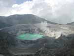 Looking into the crater of Volcán Poás - the green lake at bottom is about half a kilometer across and full of hot, acidic water. Mmmm, delicious.